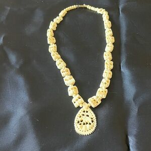 Bone carved elephant necklace
